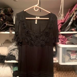 Adorable black rosette top